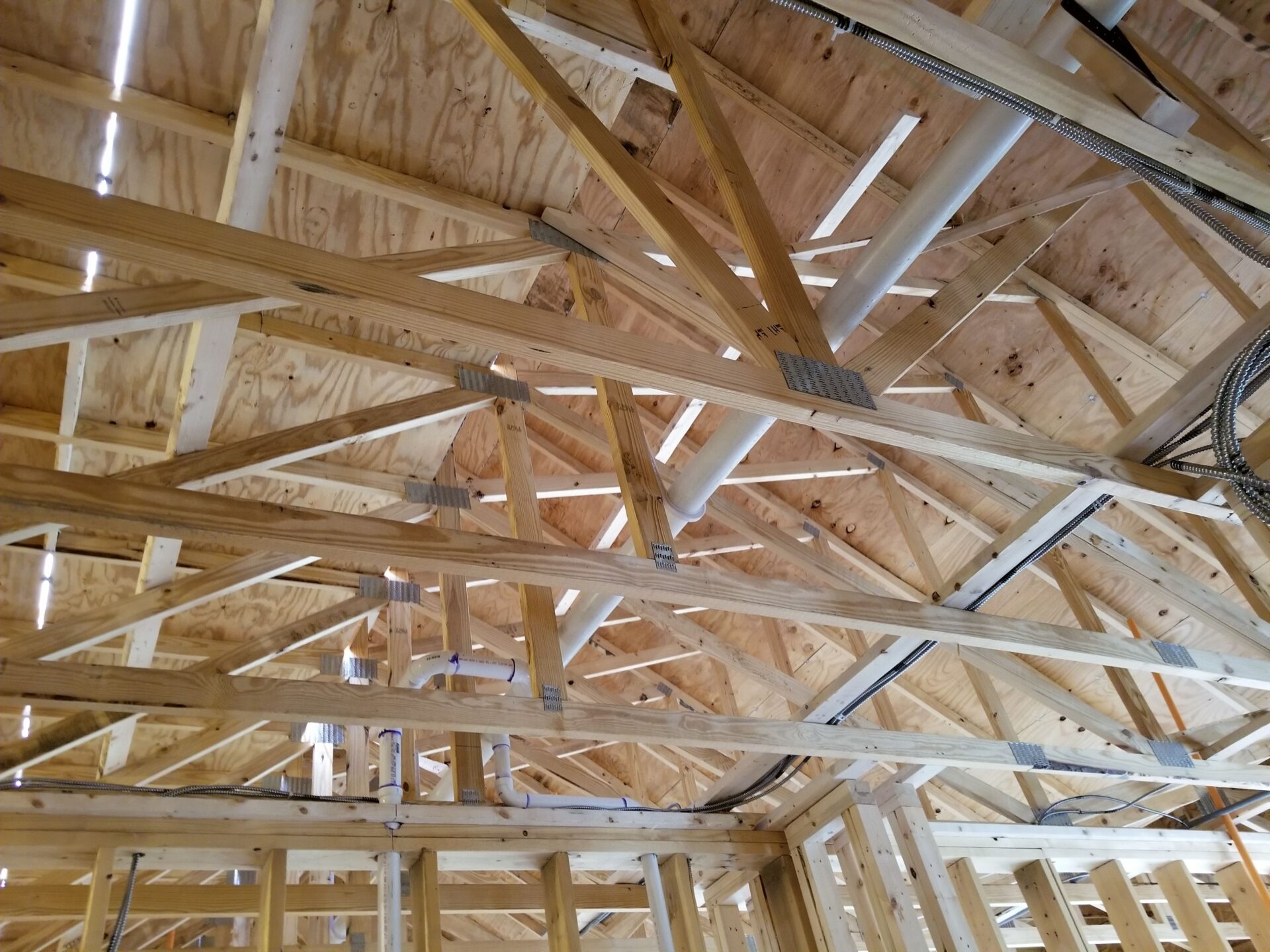 Building roof of a workshop with pipes